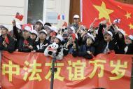 Xi receives warm welcome upon arrival in Paris